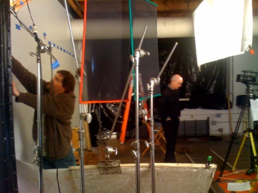 Film crew adjusting set for video